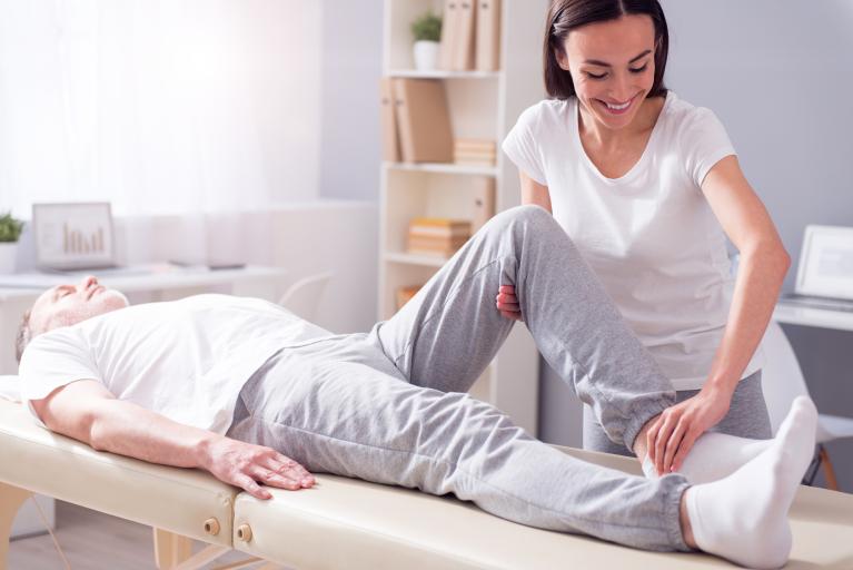 Physical Therapist with Patient